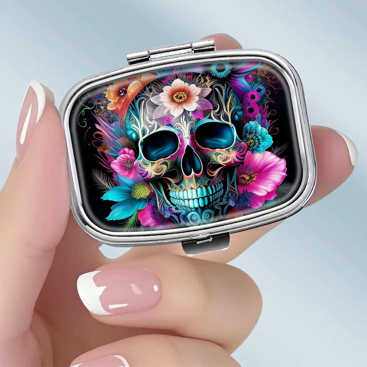 This Portable Square Metal Pill Box Features a Vibrant Skull-Themed Design, Comes in Bright Colors, and Has Two Internal Compartments, Making It an Ideal Choice for Elegantly Storing Medicines or Health Supplements. It Is Also Very Suitable for Organizing Vitamins and Storing Small Items.