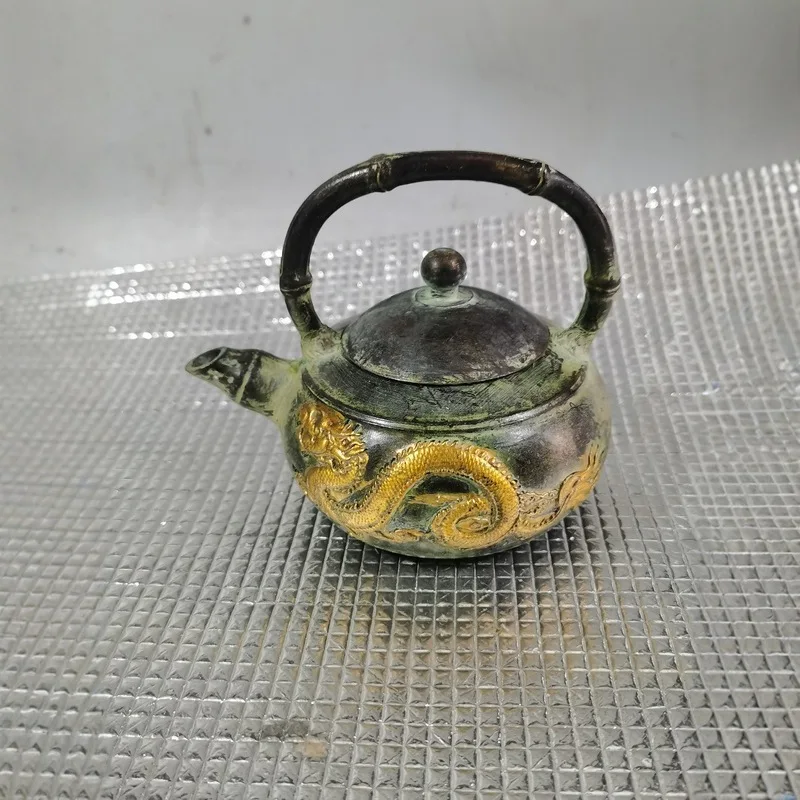 Copper wine pot made in the Qianlong era, featuring a dragon and phoenix design, with a handle. Suitable for use as a teapot, wi