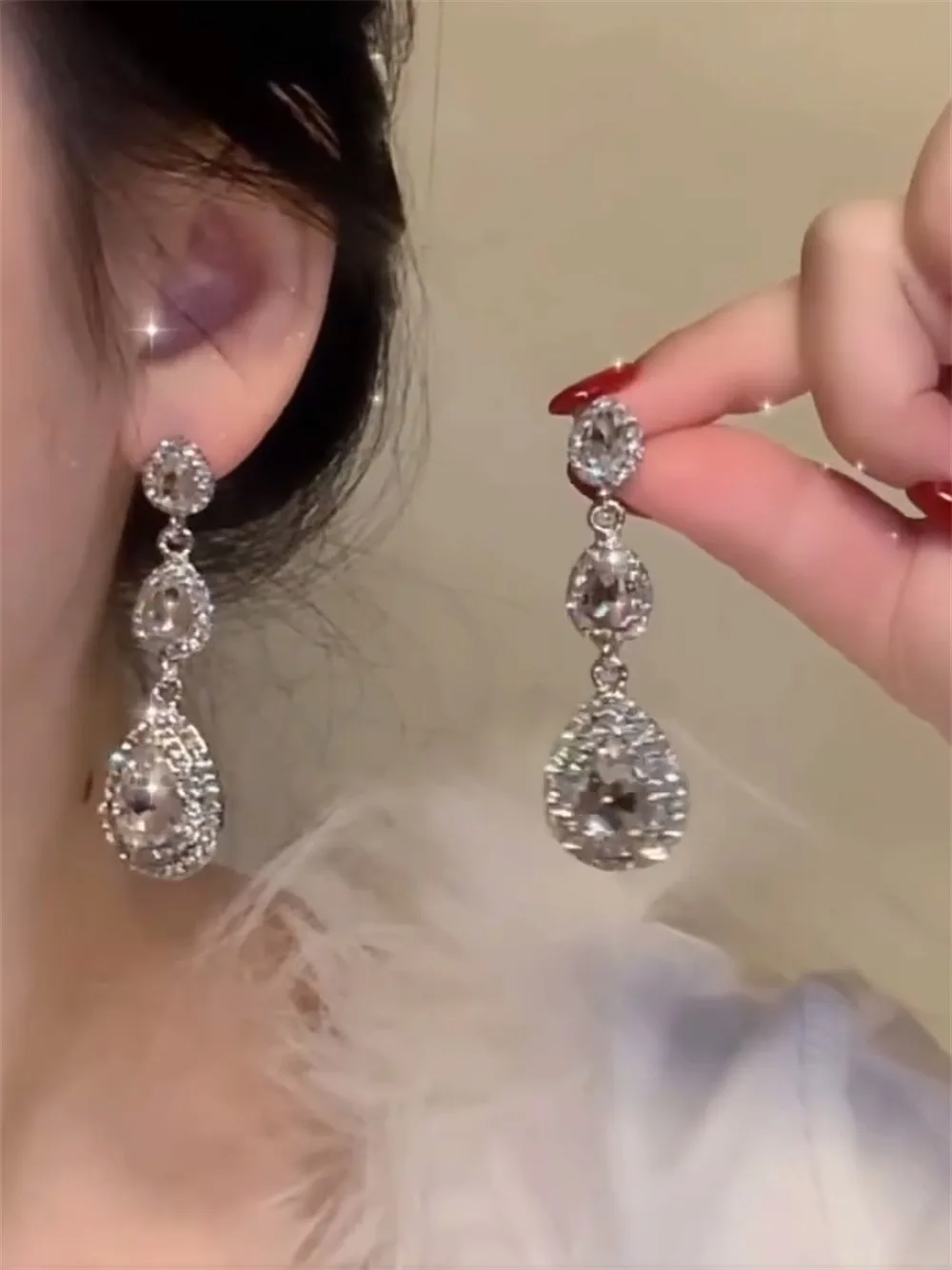 

Temperament super flash exquisite water drop zircon fringed earrings women's niche design sense