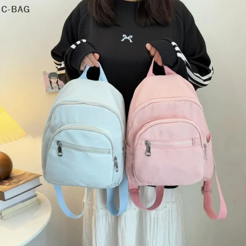 กระเป๋าเป้สะพายหลังขนาดเล็กสำหรับผู้หญิงอเนกประสงค์ กระเป๋าเดินทางน้ำหนักเบาขนาดกะทัดรัดพร้อมช่องใส่ของหลายช่อง