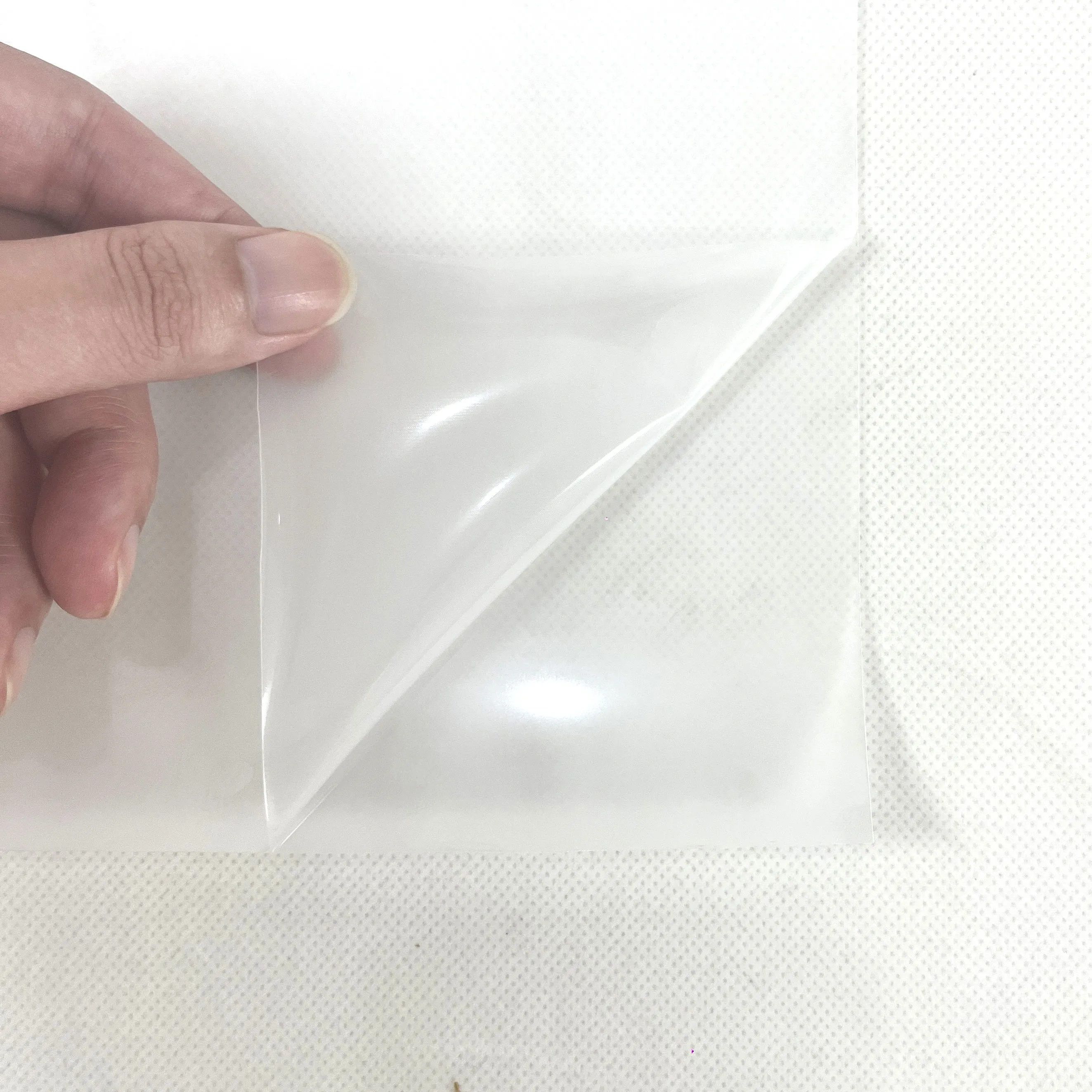Wärmeübertragbares transparentes Silikon-Vinyl, Sublimations-Buchstabenfolie, rutschfeste Buchstabenfolie, Silikon-Vinyl für Yoga-Kleidung