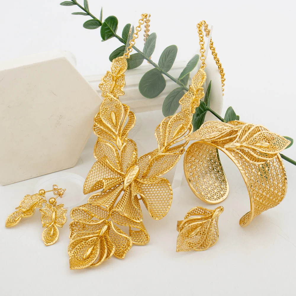 

Jewelry Set Four Piece Set of High-end, Beautiful and Atmospheric Gold-plated Necklace Earrings Wristbands Rings Fashionable