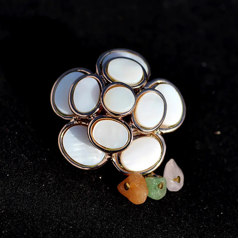 

Simple personality camellia shell brooch