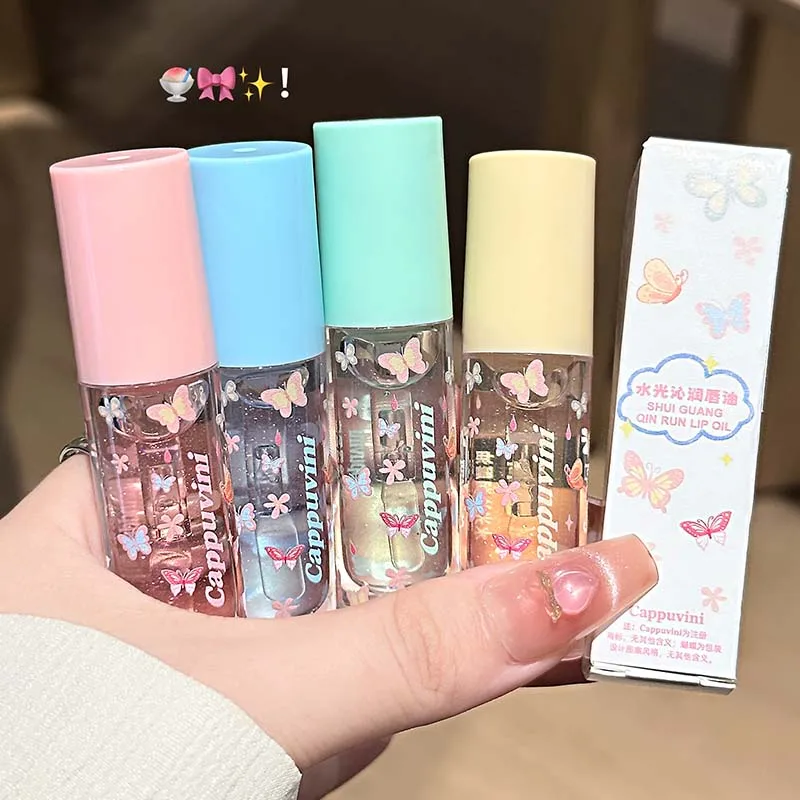 ลิปกลอสเนื้อเจลใสชุ่มชื้น ฉ่ำวาว ให้ความเงางามแบบกระจก ช่วยบำรุงริมฝีปากให้ดูอวบอิ่ม