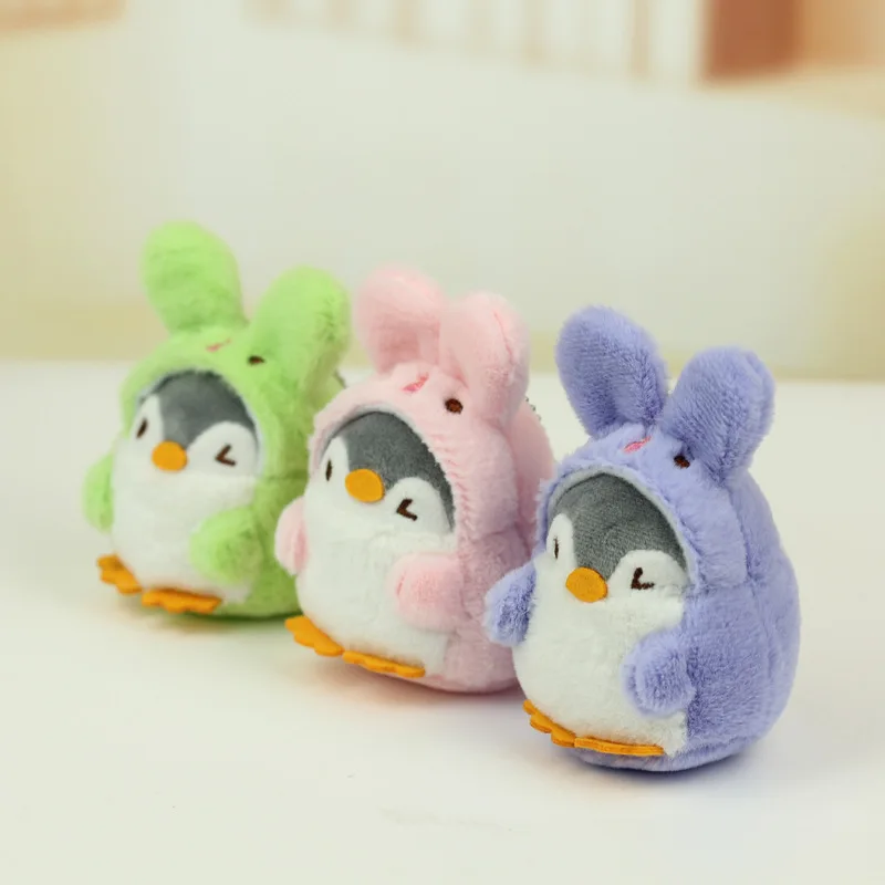 دمية قطيفة على شكل بطريق أو أرنب لطيف، قلادة مفاتيح أو زينة للحقائب