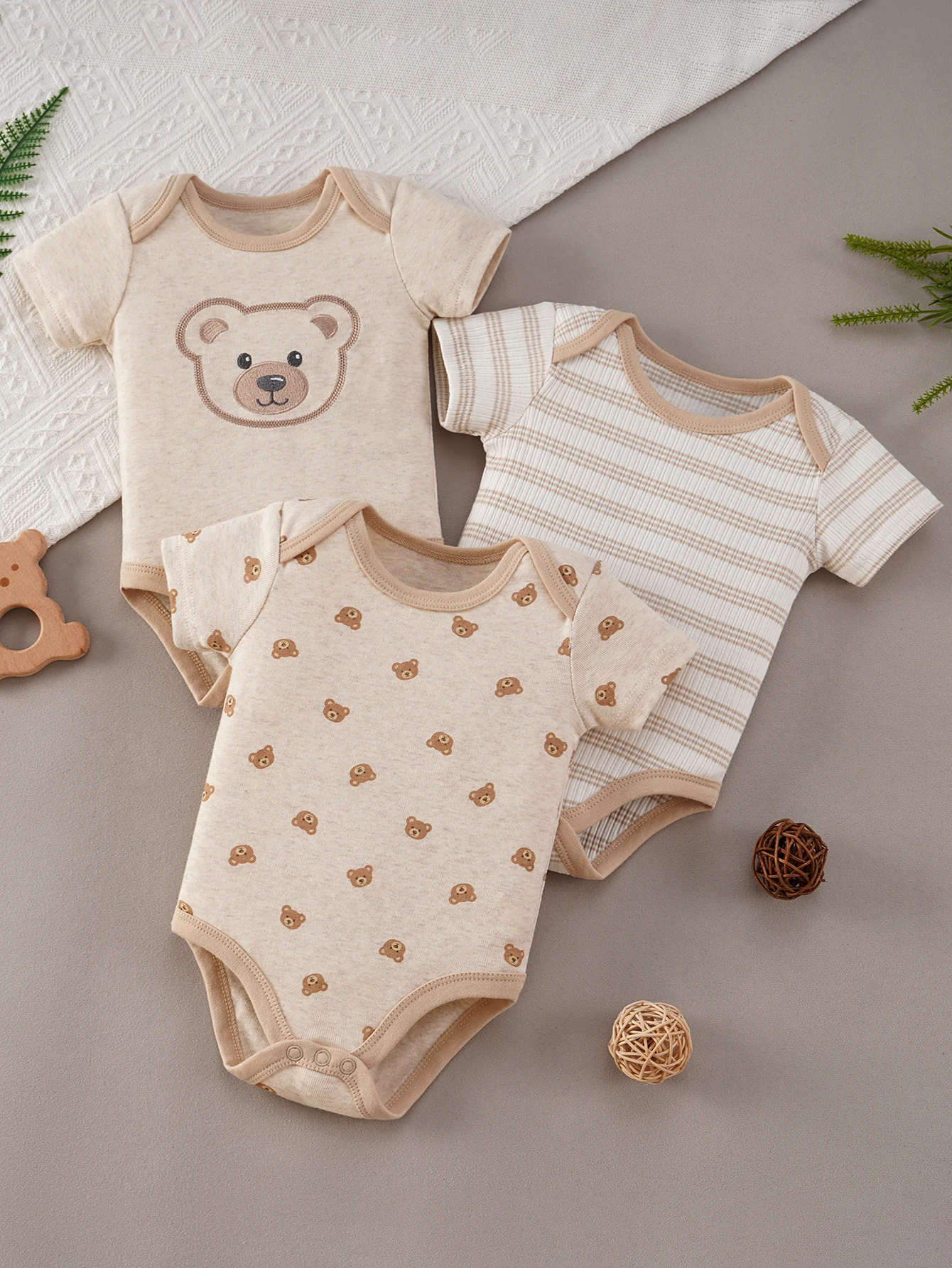 3-piece newborn triangle romper set with cute bear pattern, suitable for casual wear for boys aged 0-9 months, ideal as a gift for newborns, and perfect for outdoor activities