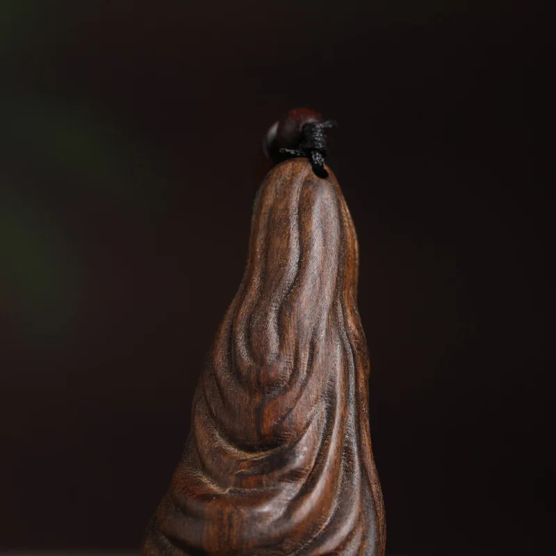 Wooden artifact: naturally shaped agarwood pendant with insect carvings, unique antique-style cultural ornament, suitab