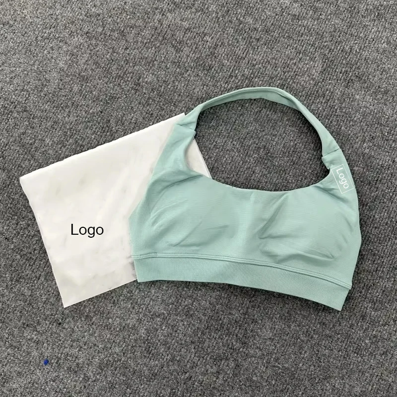 حمالة صدر رياضية للنساء بشعار D Impact حمالات صدر بدون خياطة مع شعار مبطن مفتوح الظهر حمالة صدر لليوجا متوسطة الدعم لصالة الألعاب الرياضية