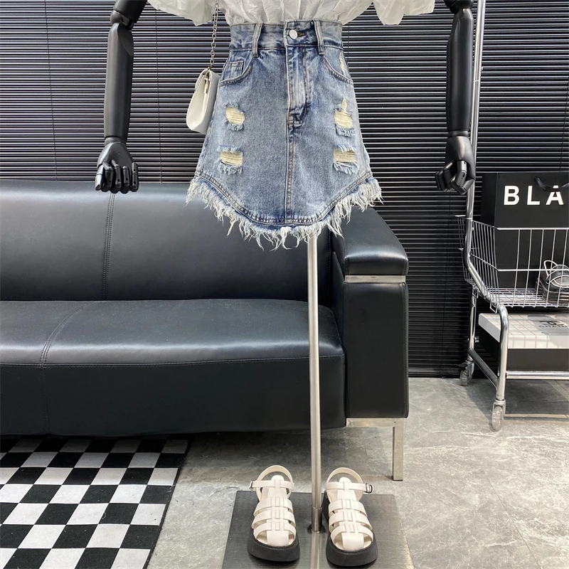 

New 2022 fashion Designer new style Famous brand tassels hole Denim skirt High waist Burr Irregular A-line skirt