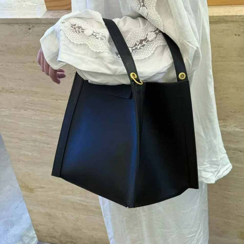 

Новые весенне-летние сумки из воловьей кожи: нишевый универсальный дизайн, большая вместимость, изысканная простота, комфорт, без логотипа.