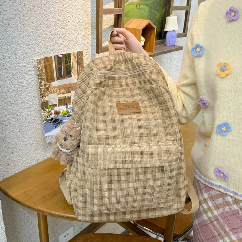 

Forest style ins wind lamp core velvet checkered backpack for female middle school students, leisure versatile travel backpack
