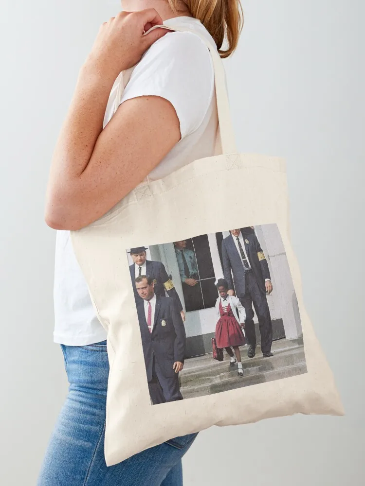 

Ruby Bridges, escorted by U.S. Marshals to attend an all-white school, 1960 Tote Bag tote bag women Shopper bag female