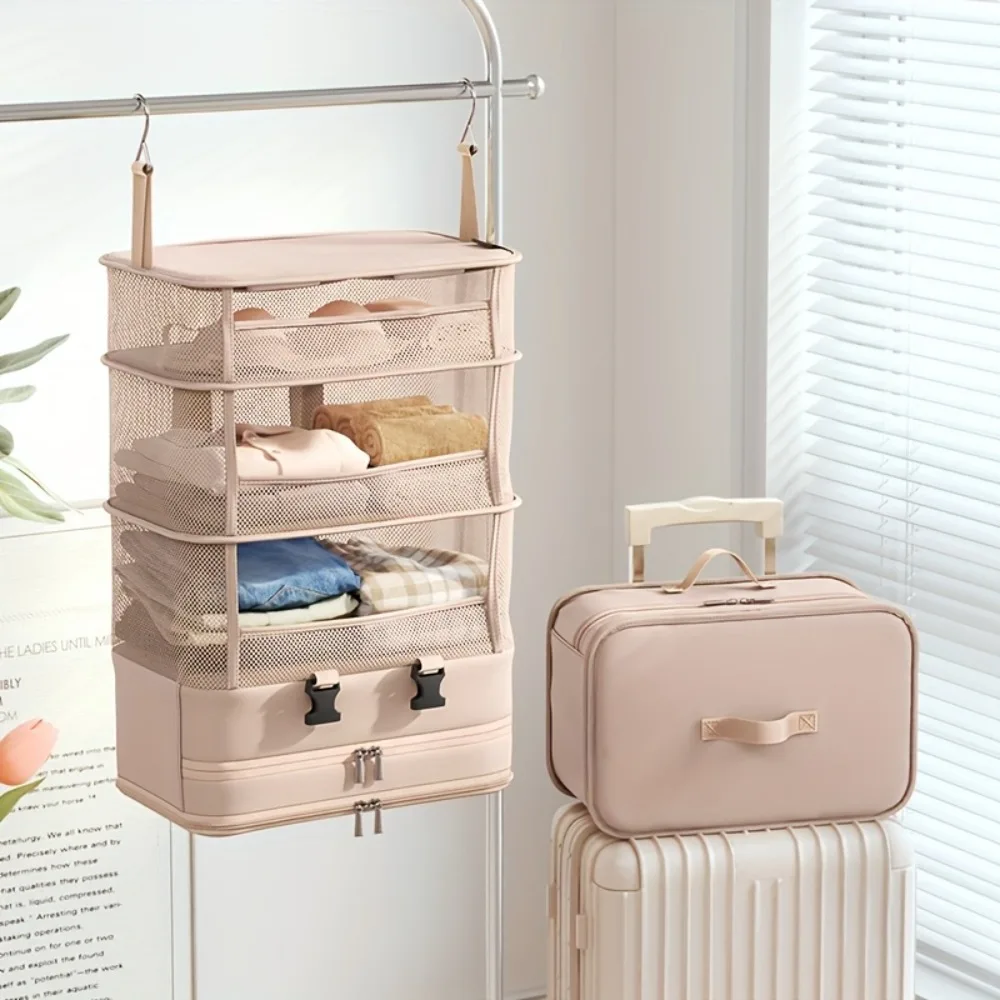 

Foldable Multi-Layer Hanging Travel Organizer Bag, Mesh Wardrobe Storage with Zippers Hooks and Handles Ideal for Business Trips