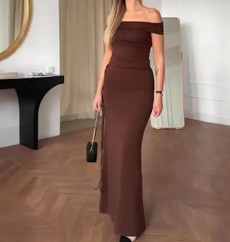 

Women's Two-Piece Set 2025 Latest Hot Selling New Solid Color Sleeveless Backless Top with Straps, Hip Hugging Long Skirt Set
