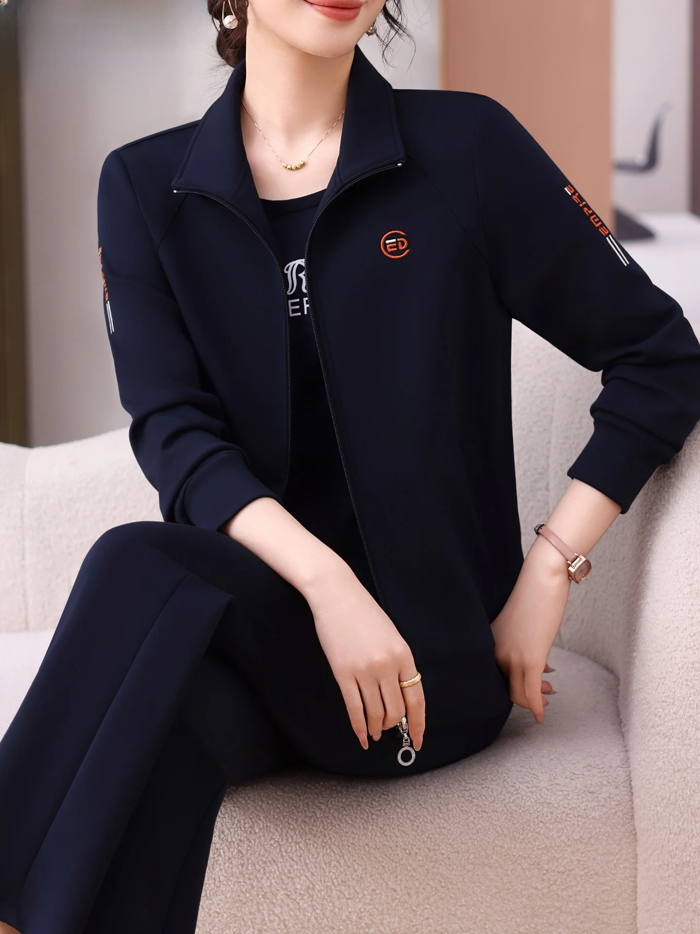 

Спортивный костюм Sli для женщин старше 40 лет: свободные брюки и футболка из полиэстера с молнией, комплект из двух предметов