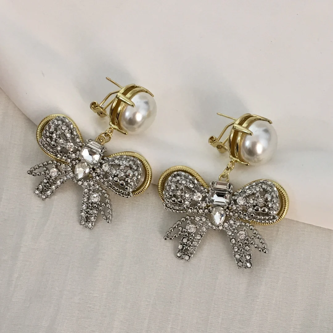 

Early spring 24 new bow pearl earrings necklace hairpin pendant female imitation crystal earrings