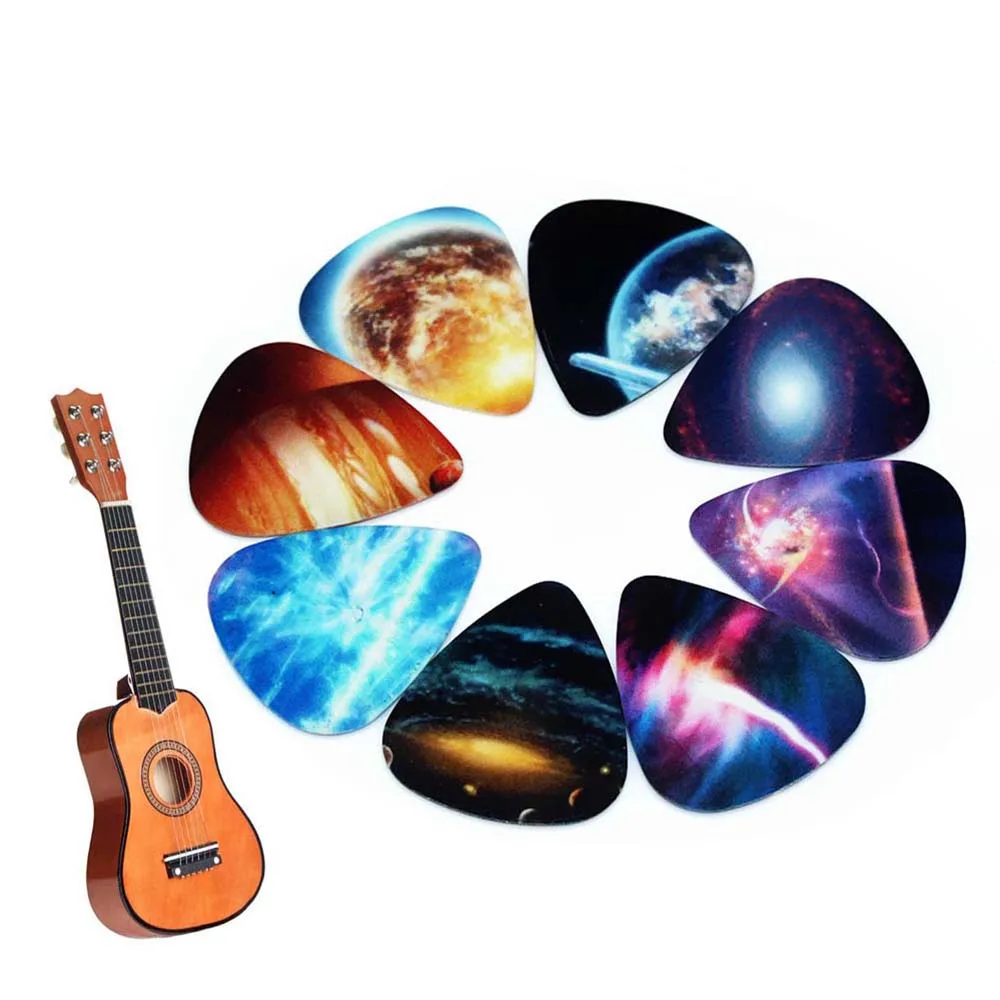 10pcs/Lot 0.71mm thickness Vastness of the universe Star guitar picks pattern guitar strap guitar parts Guitar Accessories