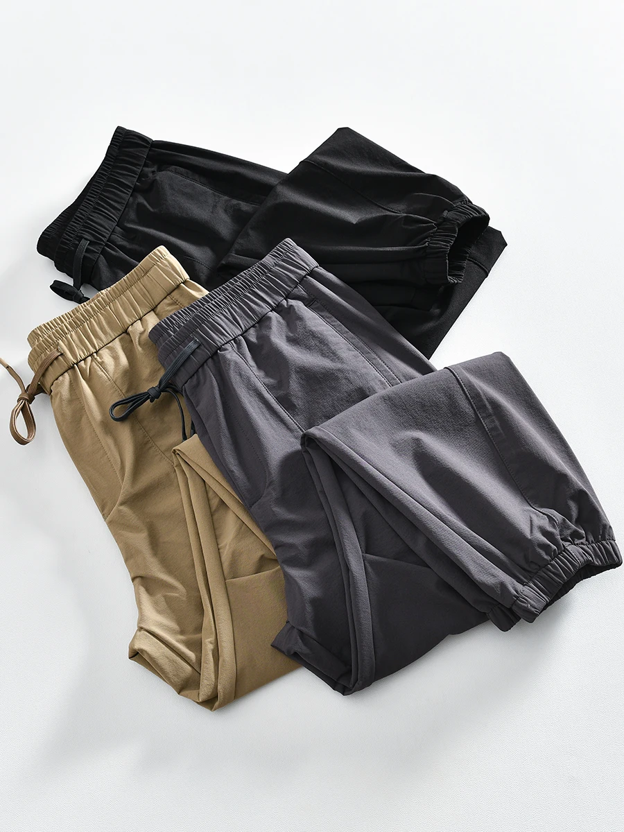 

Outdoor Functional Men's Casual Pants Elastic Waist Cuffed Loose Fit Breathable Polyester Pure Color Autumn Fashion Trend
