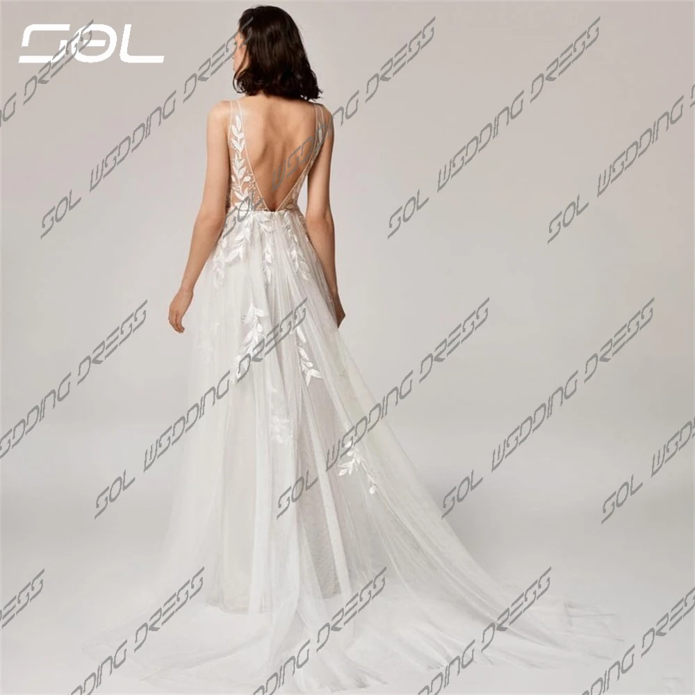 Gaun pernikahan Tulle tali Spaghetti leher V rendah elegan gaun pernikahan BOHO applique Backless gaun pengantin A-Line gaun kustom seksi