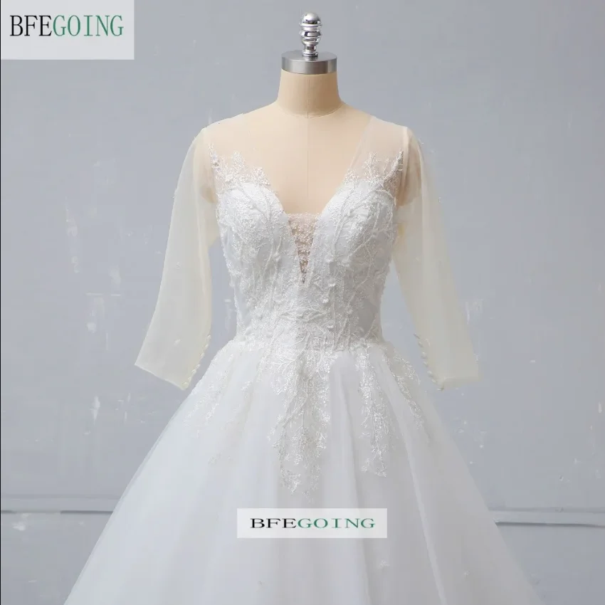 Gaun Pengantin Renda A-Line Kereta Kapel Gaun Pengantin Panjang Selantai Kerah V Lengan Panjang Kustom Rok Berlapis