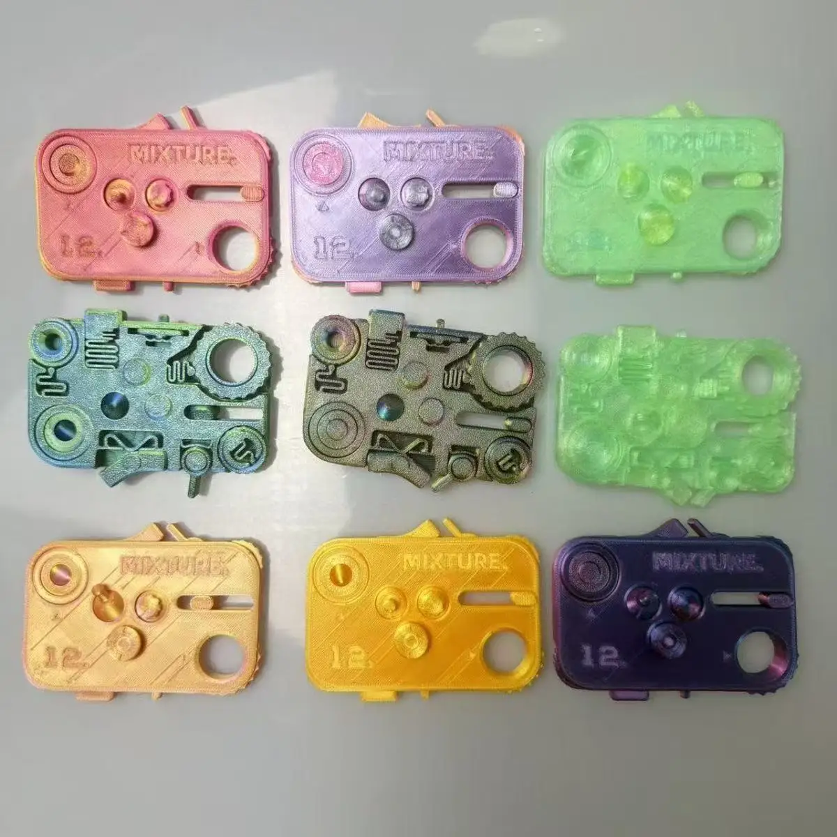 12 IN 1 พลาสติกกลางแจ้งแบบพกพา Edc Finger Gyro Release ของเล่น