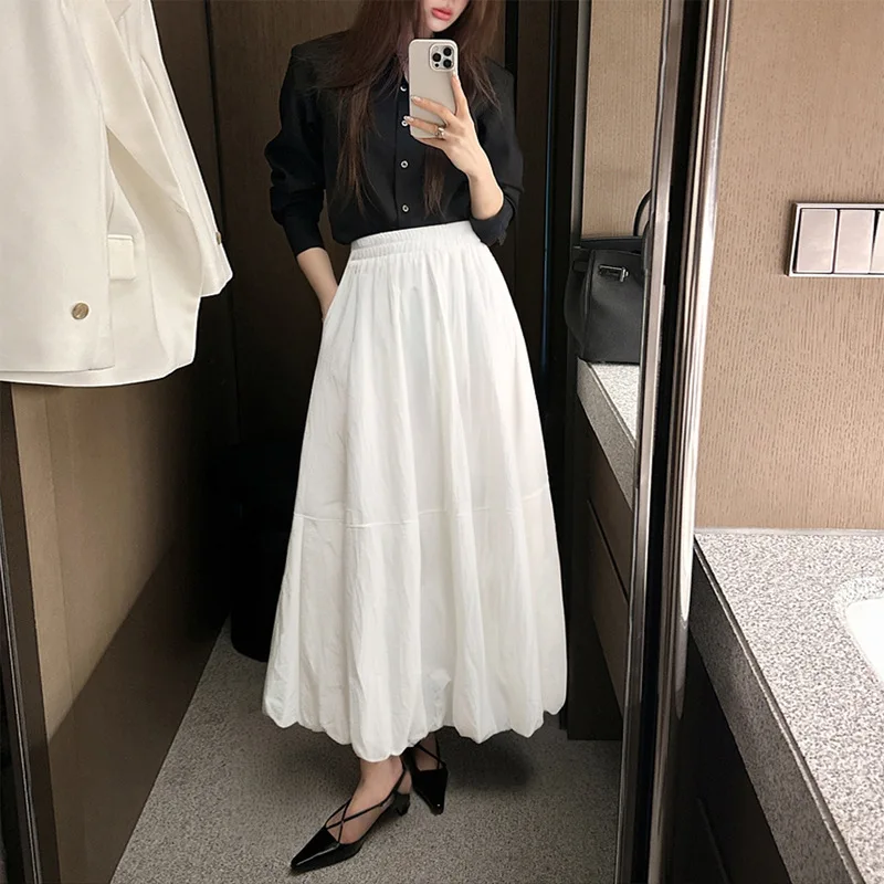 

White flared skirt for women2026New Spring/Summer High-Waisted Hip-Covering StyleaPetite figure slimming tulip skirt