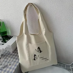 Women's butterfly and slogan graphic pockets, front printed shopping handbag, large capacity canvas shoulder bag Casual Tote