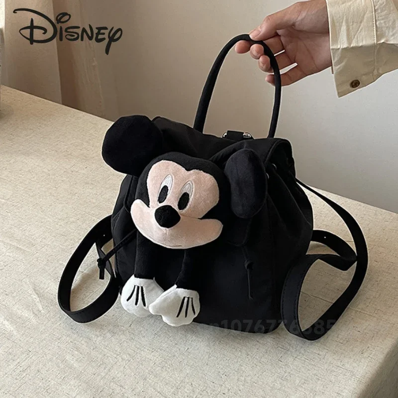 Mickey 2024กระเป๋าเป้แฟชั่นผู้หญิงใหม่, กระเป๋าเป้สะพายหลังตุ๊กตา3D คุณภาพสูงอเนกประสงค์สีทึบจุของได้มาก