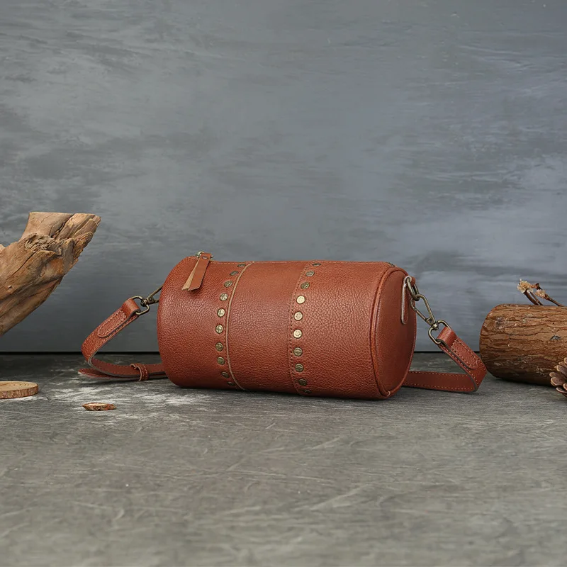 Genuine rivet cylinder bag vintage vegetated tanned head layer cofskin one shoulder diagonal span bag for men and women