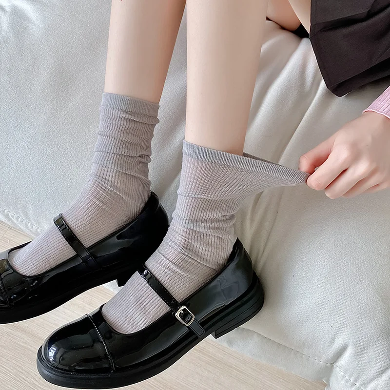 Chaussettes coréennes fines en coton pour femmes, respirantes, à la mode, solides, longues, style japonais, pour écolières, noires et blanches, été