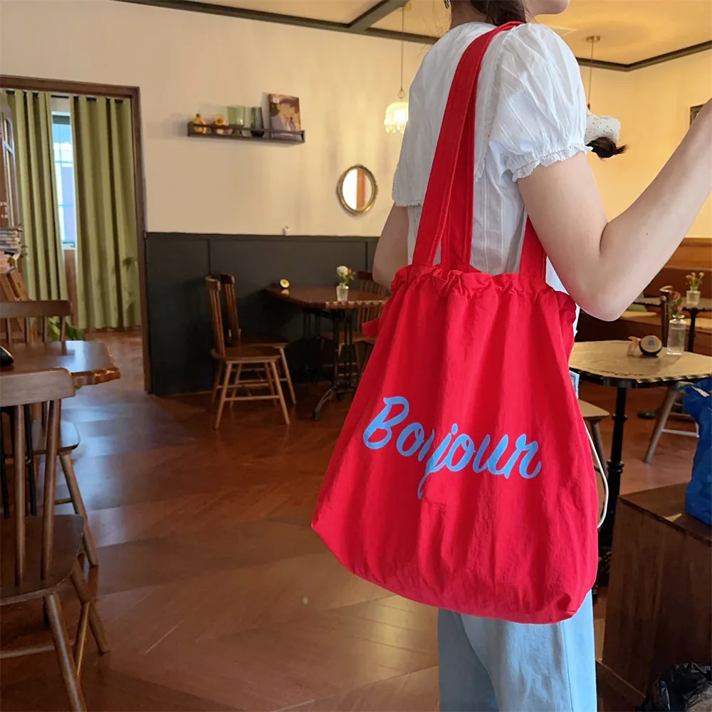 bolsa-de-ombro-estilo-coreano-com-estampa-de-letras-bolsa-casual-com-cordao-bolsa-de-ombro-fashion-para-estudantes