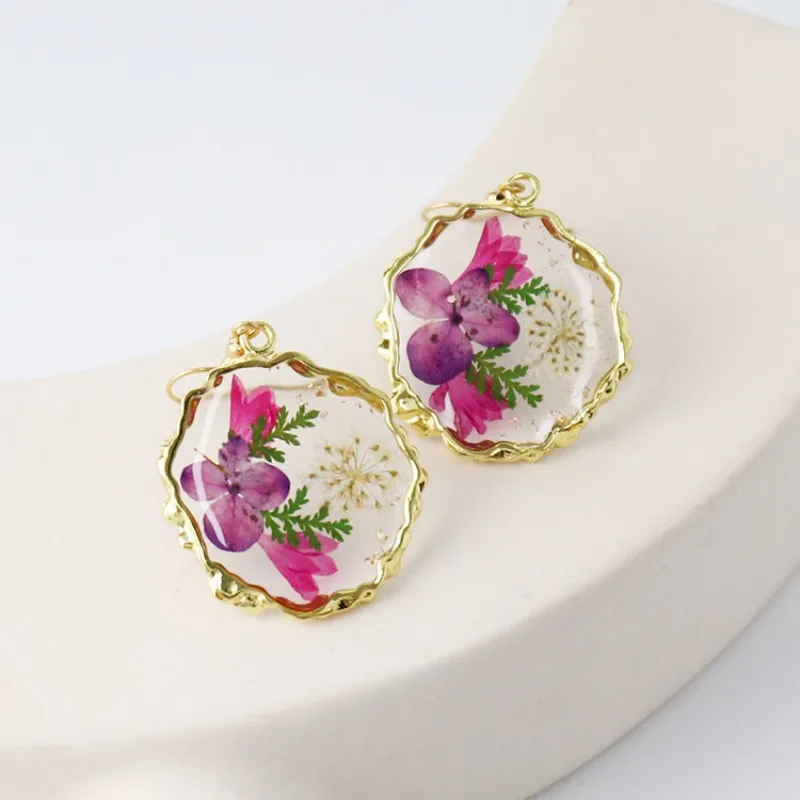 

Exquisite Dried Flower Earrings Women Unique Epoxy Resin Pressed Flower Earrings Colorful Flower Natural Earring Wholesale 2025