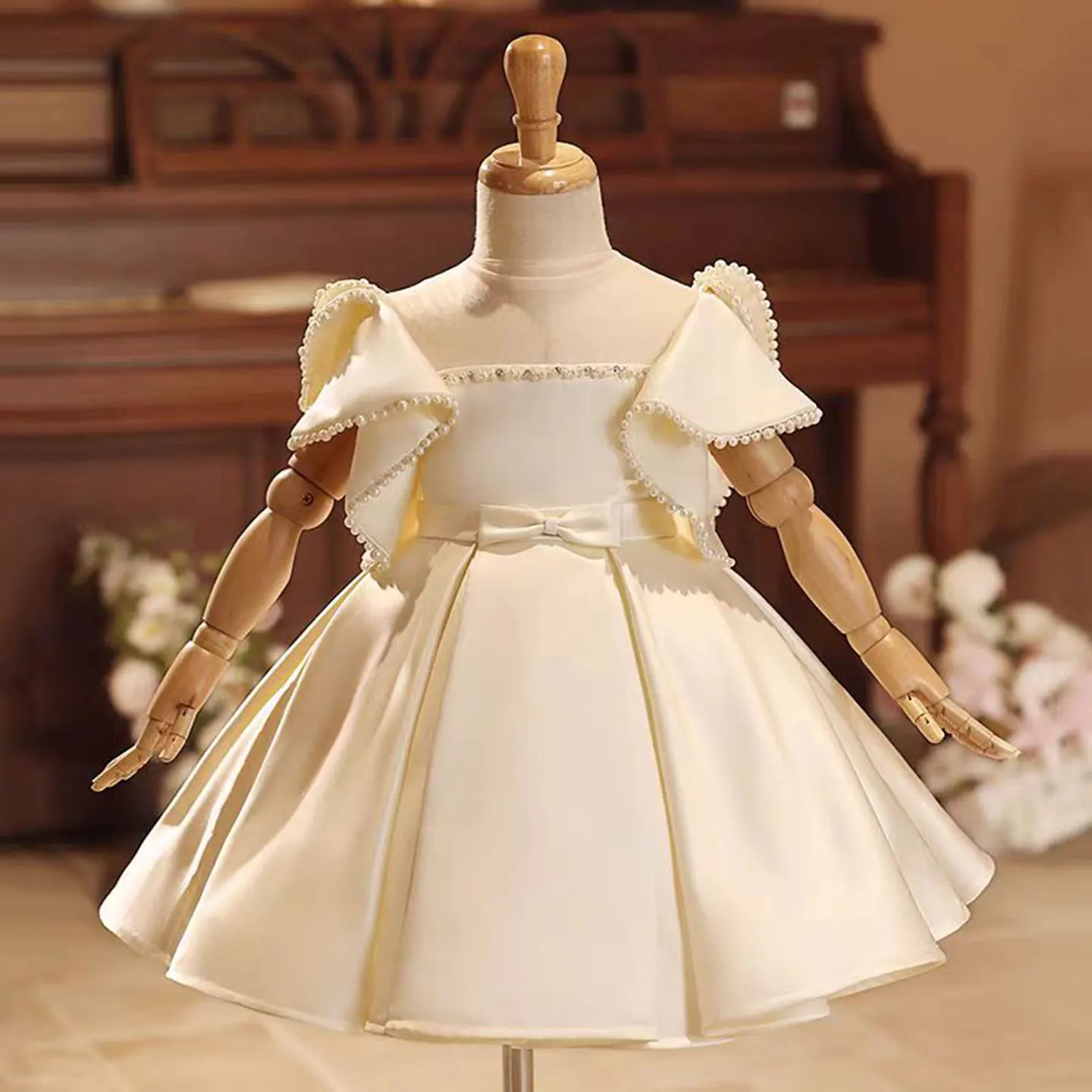 

Dreamy Vow Charming Champagne Baby Girl Dress With Bow Stain Wedding Birthday Holiday Party Spring Knee Length Ball Gown J497