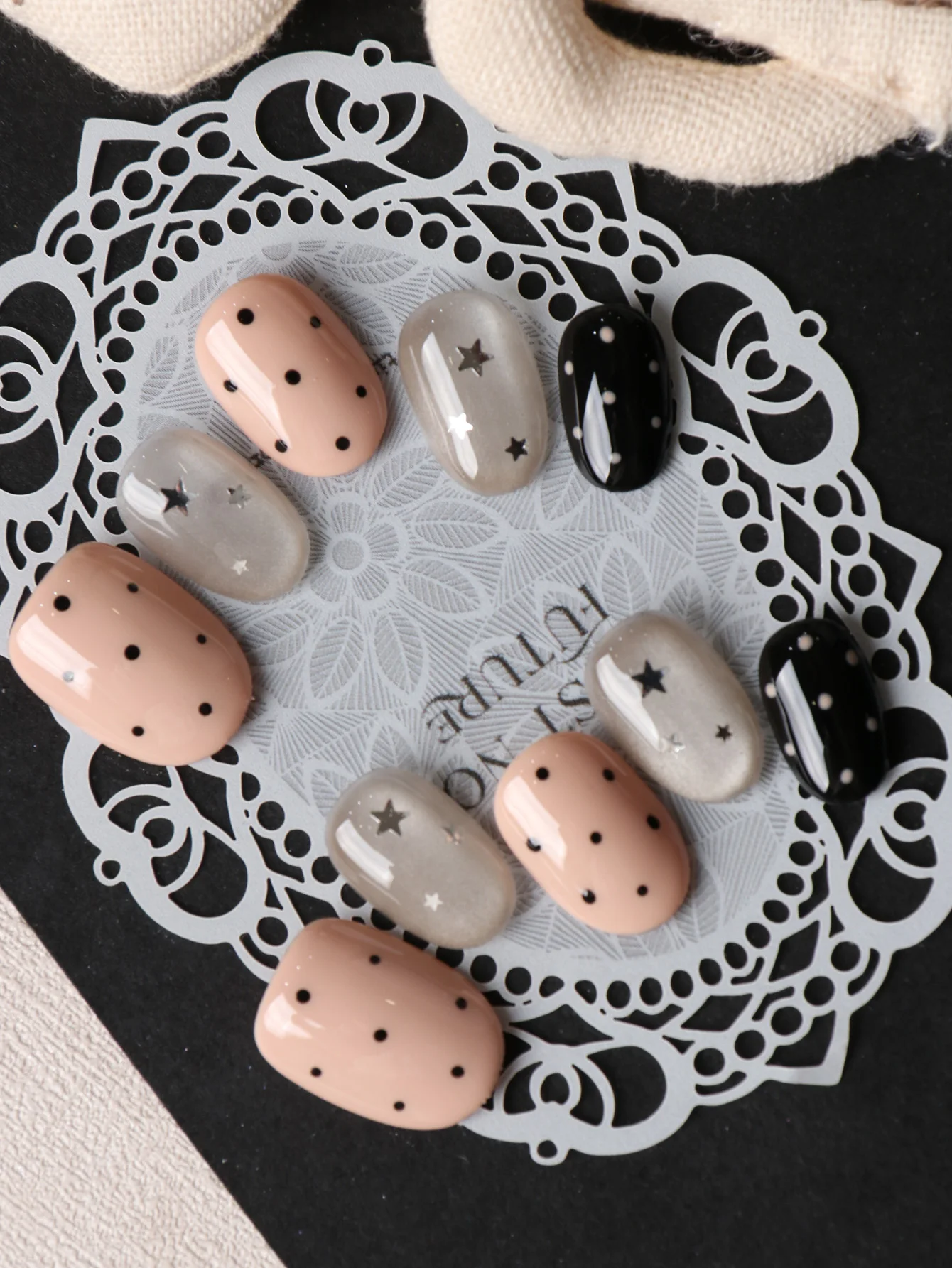 10Pcs Press on Nails Short Skin Color White Cat's Eye Star Polka Dot Fake Nails Includes 1 Sheet of Adhesive Tabs & 1 Pc Mini File