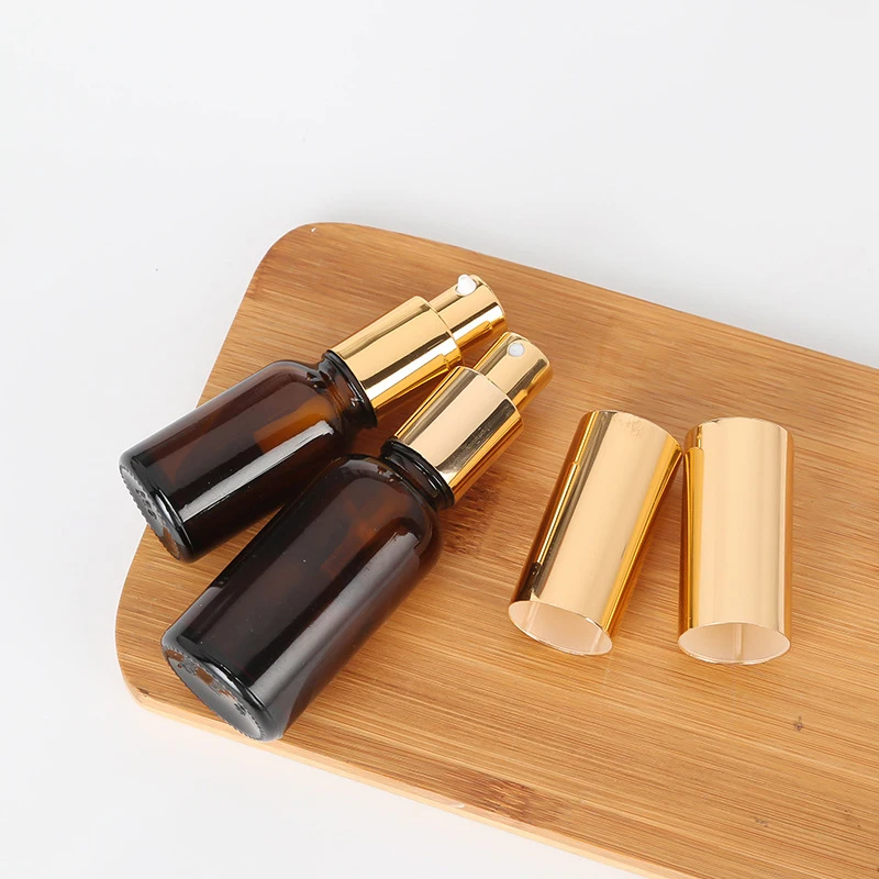 Botella pulverizadora de vidrio ámbar con tapa dorada brillante, bomba de Perfume/tóner/aceite, loción de agua, base en Gel, maquillaje, recambio para el cuidado de la piel de viaje