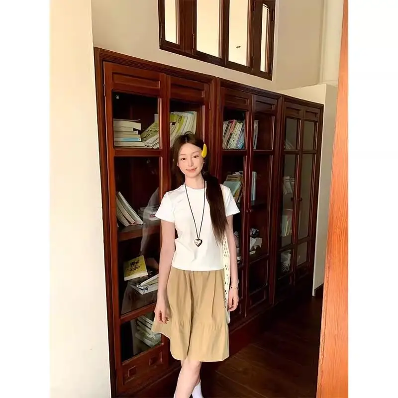 กระโปรงทรงเอ สไตล์ลำลอง แฟชั่นฤดูร้อน 2025 สำหรับผู้หญิง สีกากี ผ้าโพลีเอสเตอร์ สีพื้น คอลเลคชั่นฤดูใบไม้ผลิ