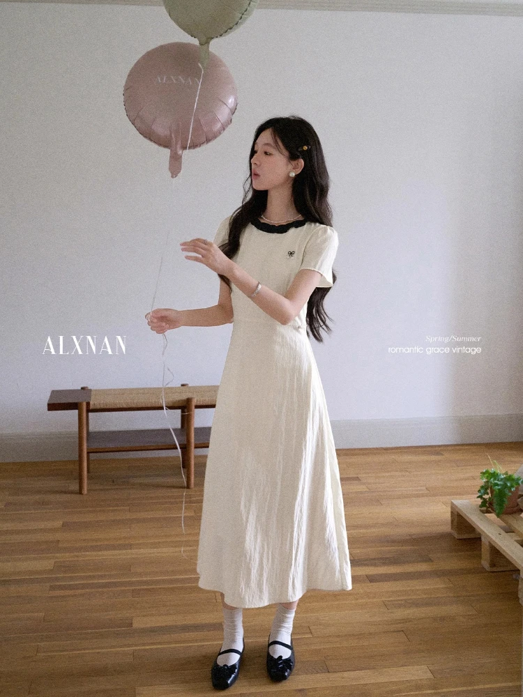 ALXNAN Beige Short Sleeve Dress with Bow Detail Black Lace Trim Pearl Buttons Waist-Defining A-Line Silhouette Summer DYL661967