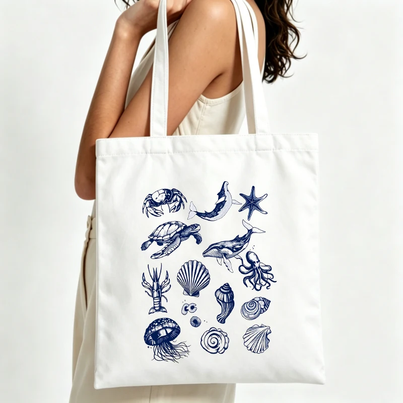 ocean animal print canvas tote bag with artistic design, ideal for summer beach outings and casual shopping