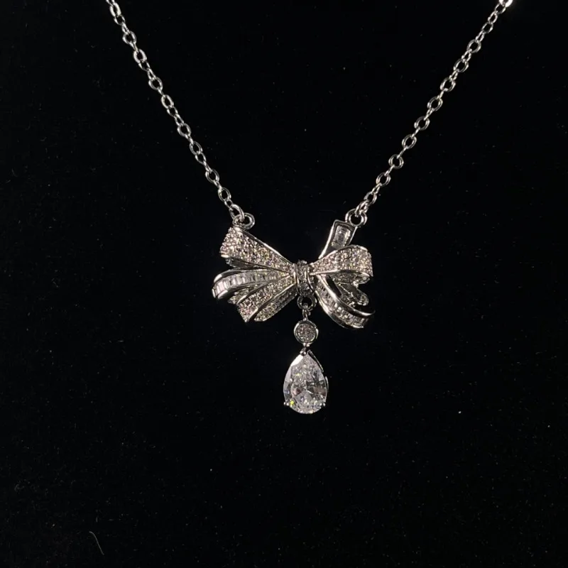 

Summer Sweet Bow Water Drop Necklace Fashion Personality Collarbone Chain Niche Design Inlaid with Diamond Giant Flash Neck