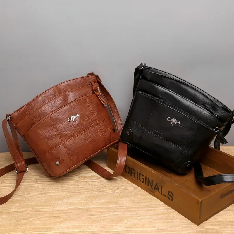 Bolso con textura de cuero suave para mujer, bandolera, nuevo bolso de hombro a la moda, tendencia Simple europea y americana, Retro, múltiples bolsillos