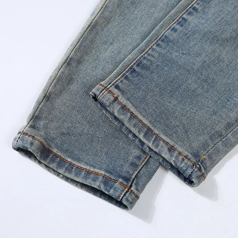 Y2K high-quality new denim jeans nostalgic washed elastic band slim fit perforated patch light blue jeans hip-hop brand pants ho - Image 6