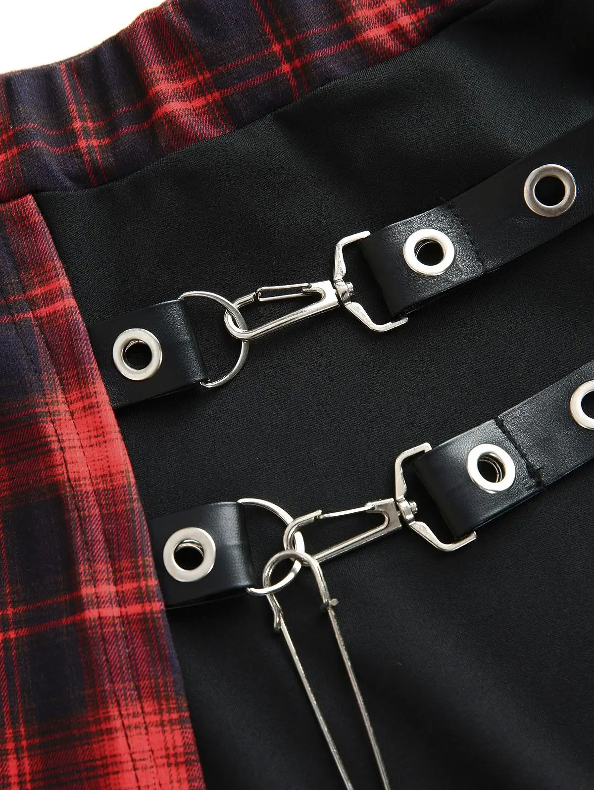 ROSEAGL حجم كبير منقوشة المرقعة الحلقات بولي Leather الجلود المشارب غير المتكافئة تنورة الإناث عادية كبيرة الحجم النساء Y2K التنانير