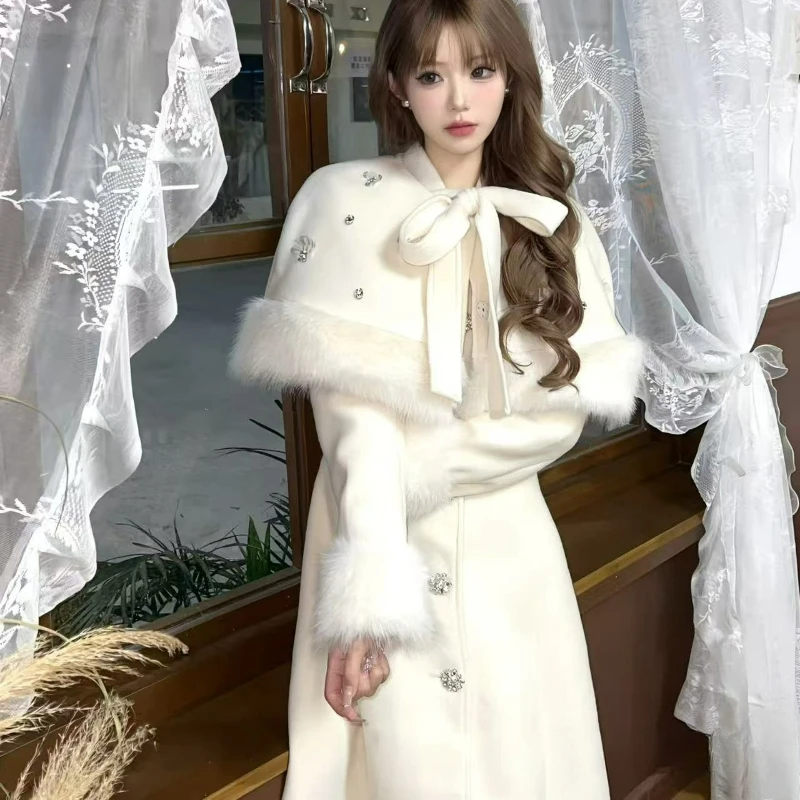 

Белое длинное однобортное шерстяное пальто в светском стиле, осень/зима 2026, новая утолщенная теплая накидка с бантом для женщин