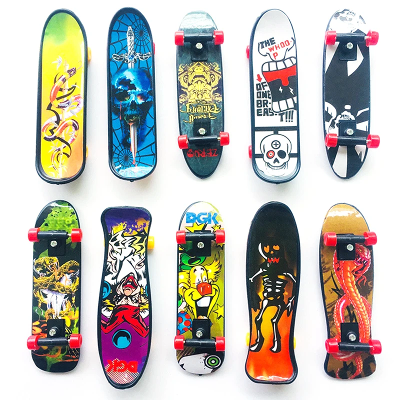 1Pc 2.8*10CM tastiera Mini punta delle dita creativa Skateboard plastica Finger Skate Scooter colore casuale