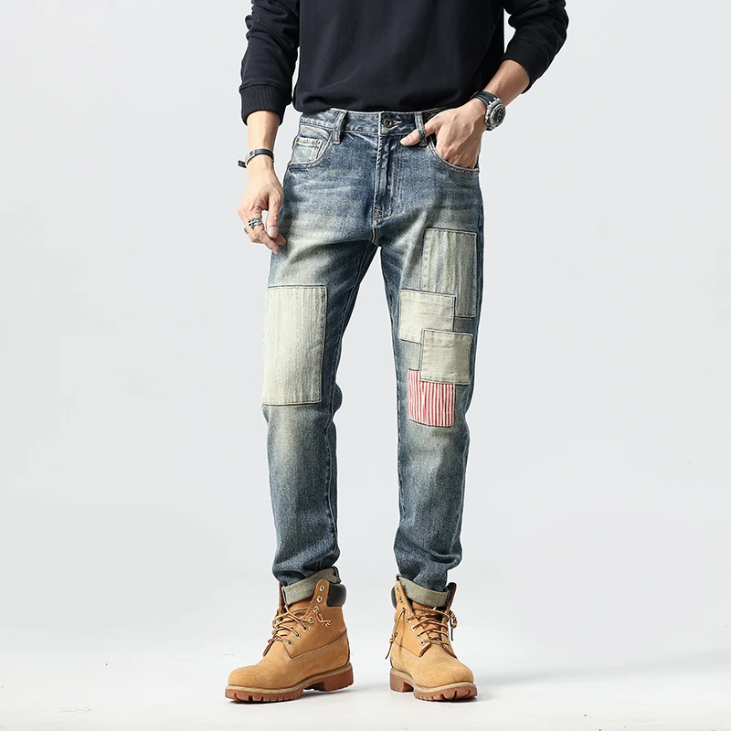Fashionable patchwork irregular patchwork design jeans for men's slim fit small straight leg elastic American trendy pants