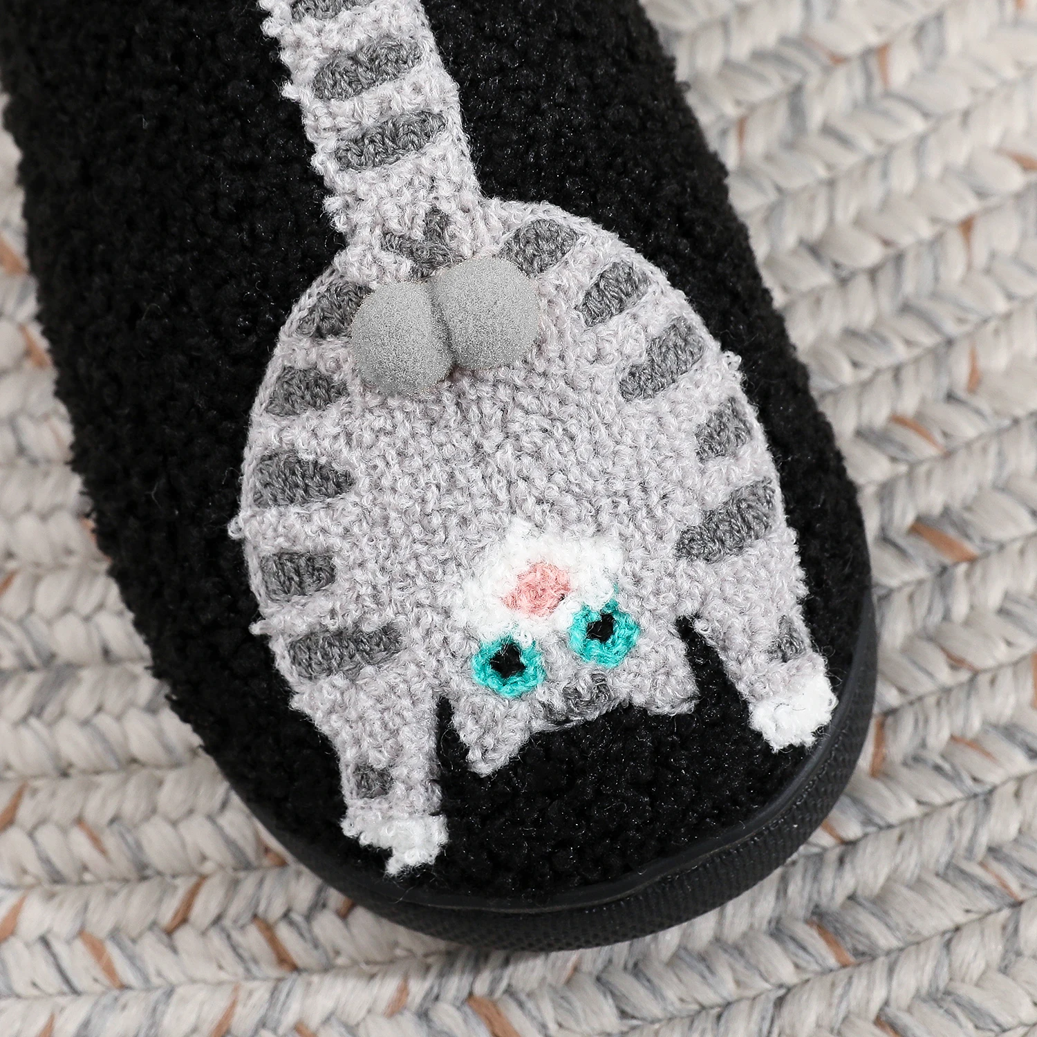 A Pair of Black Embroidered Cat-Patterned Plush Home Slippers with Thick Soles, Comfortable and Warm, Non-Slip Indoor Slippers, Personalized Gifts for Autumn and Winter, Suitable for Both Men and Women to Wear in the Bedroom view 4