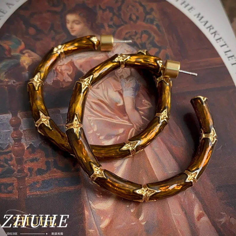 

Vintage Brown Bamboo Hoop Earrings with Gold Star Accents, Retro Statement Jewelry for Women, Trendy Party Ear Accessories 2025