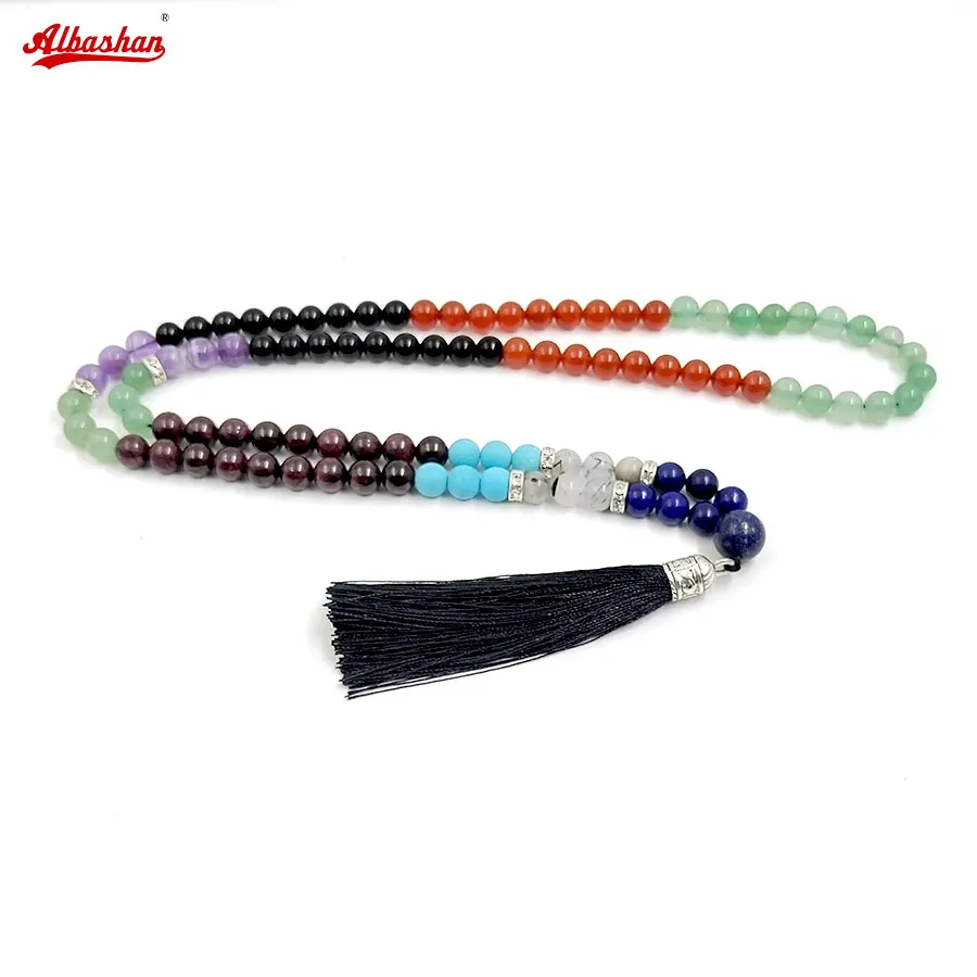 

Тасбих из 99 бусин из 8 видов драгоценных камней: лазурит, синий турмалин, красный агат, черный агат, зеленый нефрит, аметист, гранат, кварц.