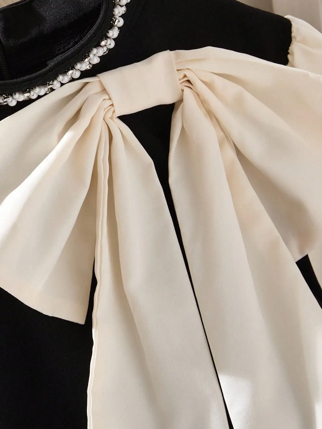 Black & Cream Color Block Dress with Pearl Studs, Bow Neck and Ruffle Hem