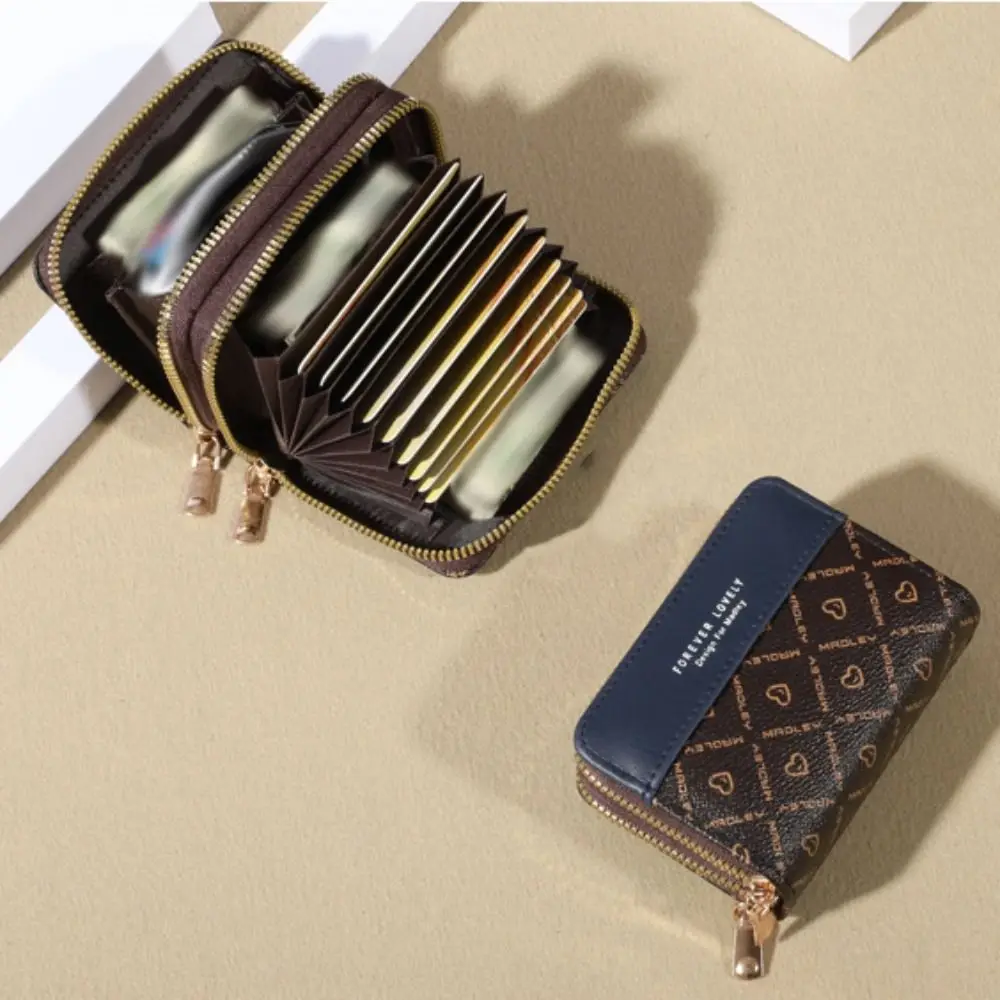 Modne portfele damskie w stylu koreańskim z blokami kolorów, krótkie portmonetki na karty z podwójnym zamkiem błyskawicznym, skórzane etui na monety i karty.